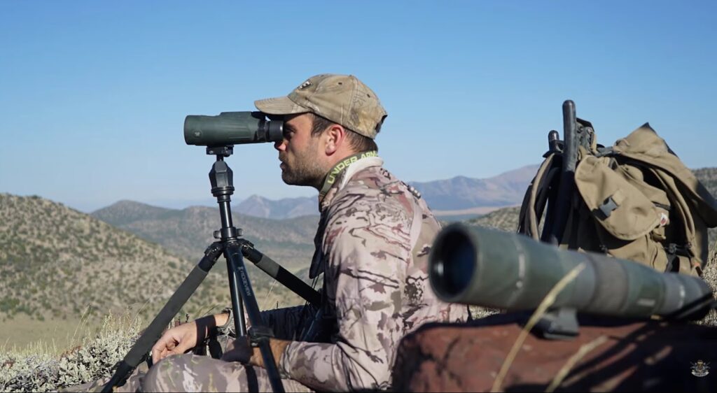 a woman looking through the scope